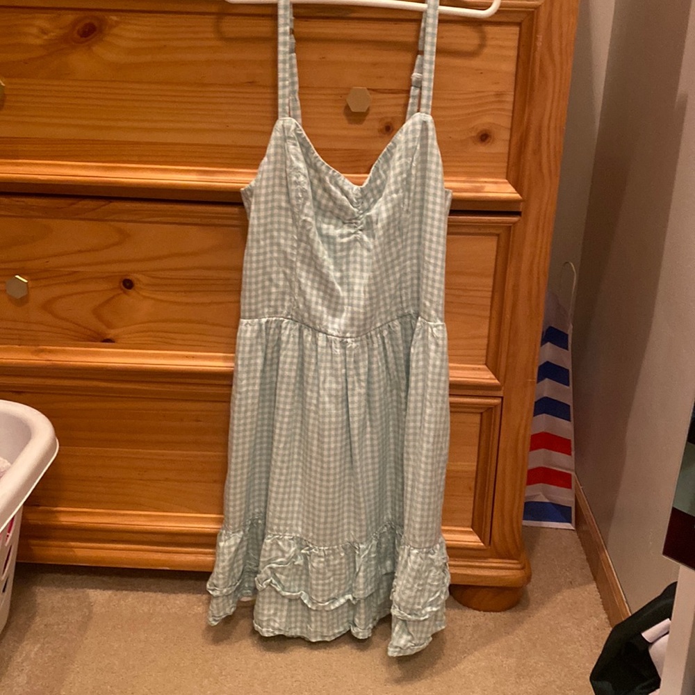 mint and white checkered sundress with a tie top.